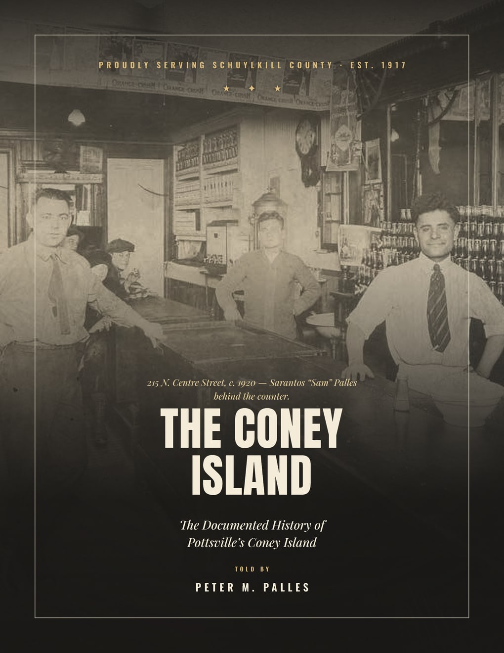 The paperback front cover: "The Coney Island," told by Peter M. Palles, over the c. 1920 photograph of the counter at 215 N. Centre Street.