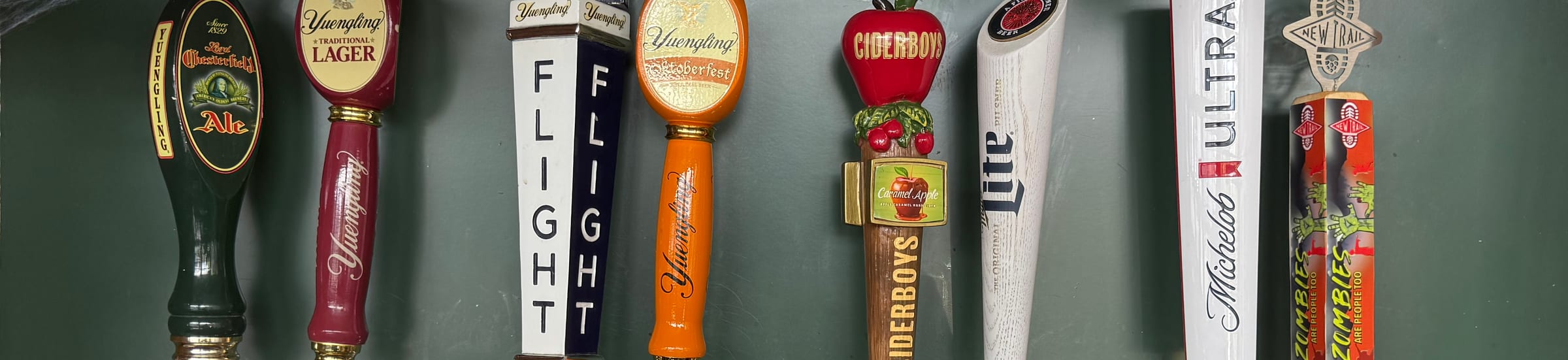 Draft beer taps at The Coney Island in Pottsville, PA — Yuengling, Yuengling Flight, Cider Boys, Miller Lite, Michelob Ultra.