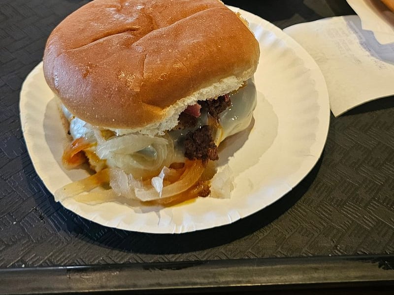 A cheeseburger with melted cheese and stewed onions at The Coney Island in Pottsville, PA.