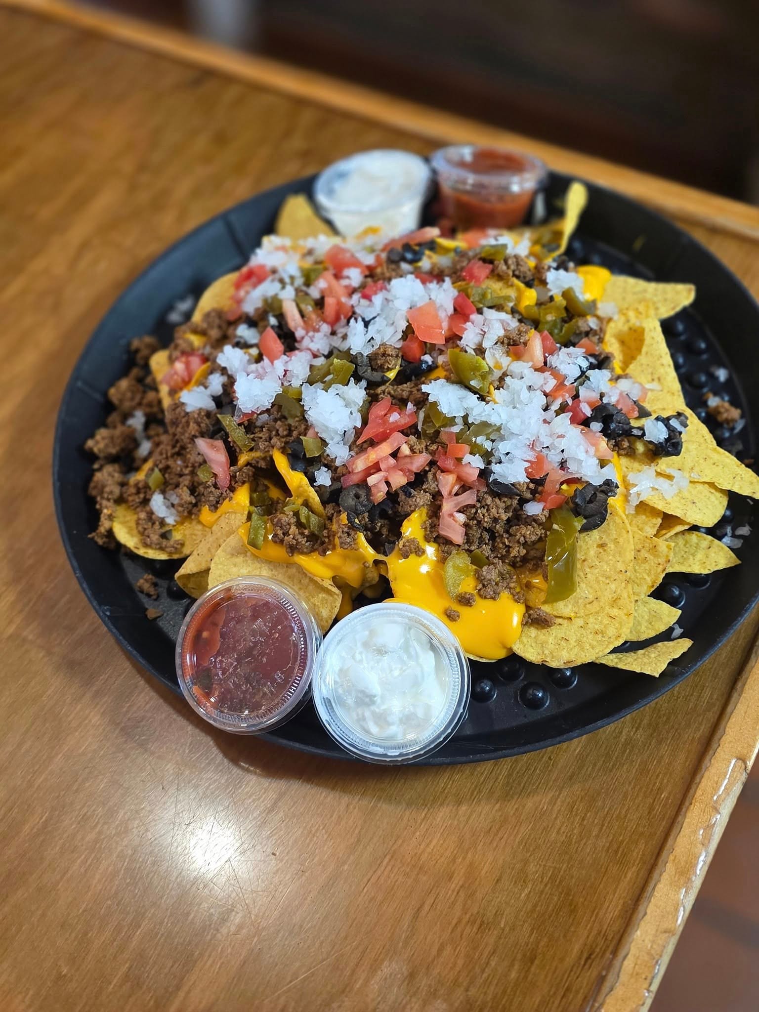 Loaded nachos with ground beef, cheese, jalapeños, sour cream and salsa at The Coney Island in Pottsville, PA.