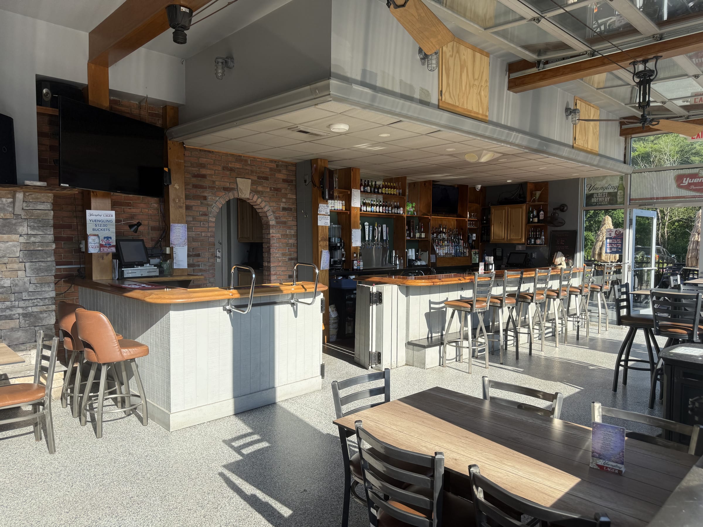 The four-season patio room at The Coney Island in Pottsville, PA — a bright, comfortable place to sit and stay.